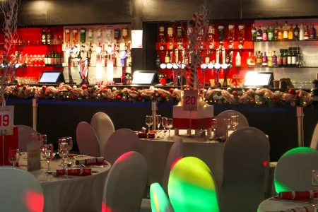 white tables with candy cane decorations